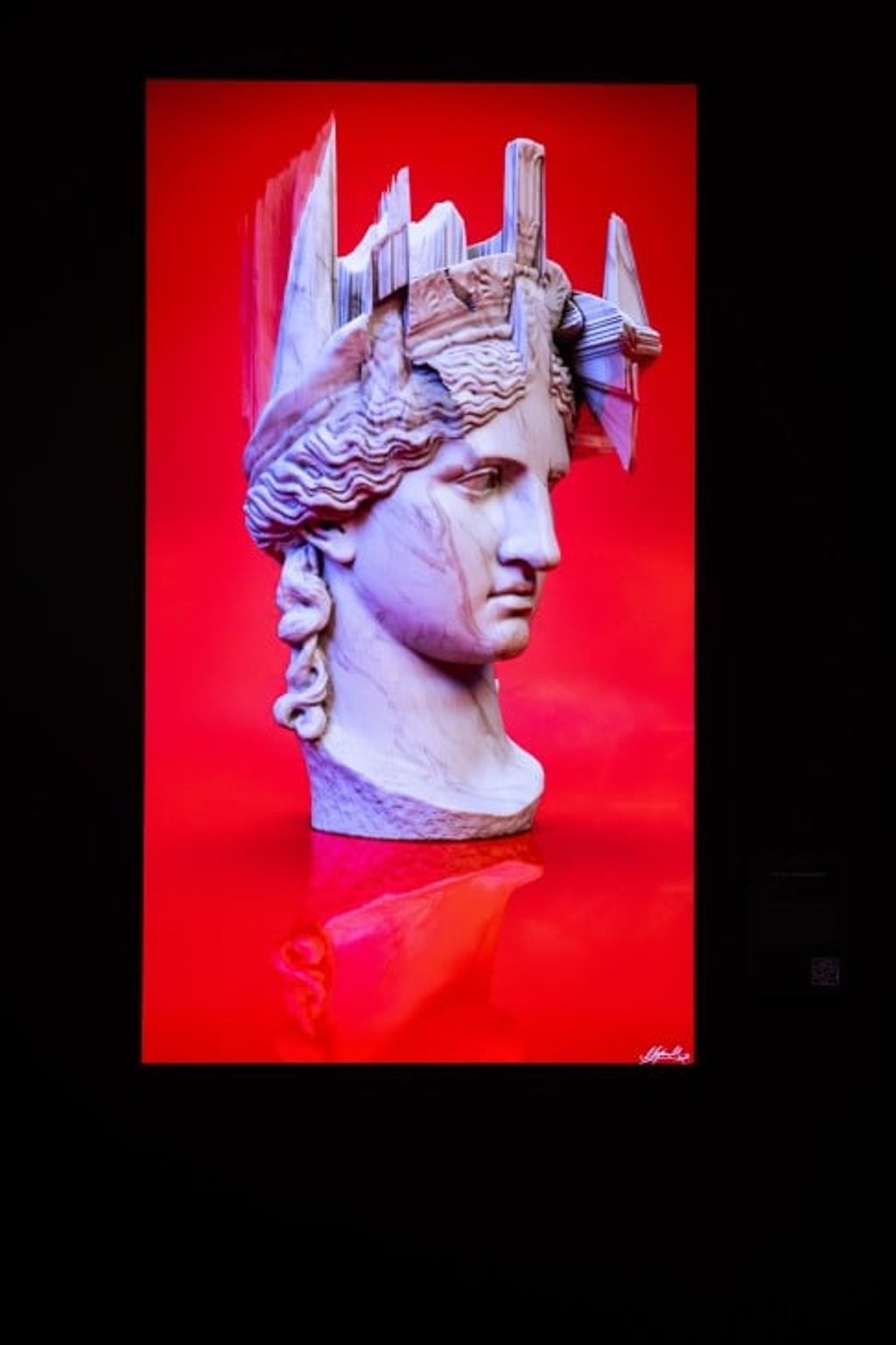 Marjan Moghaddam’s GLITCHING JUNO MONETA NFT series displayed at Digital Art Fair Xperience.